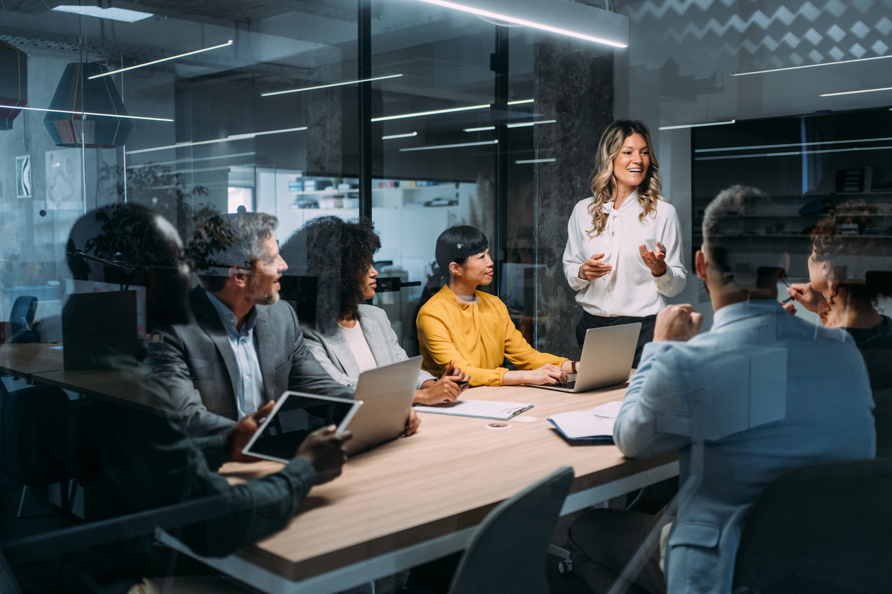 IT staff augmentation team collaborating with in-house developers